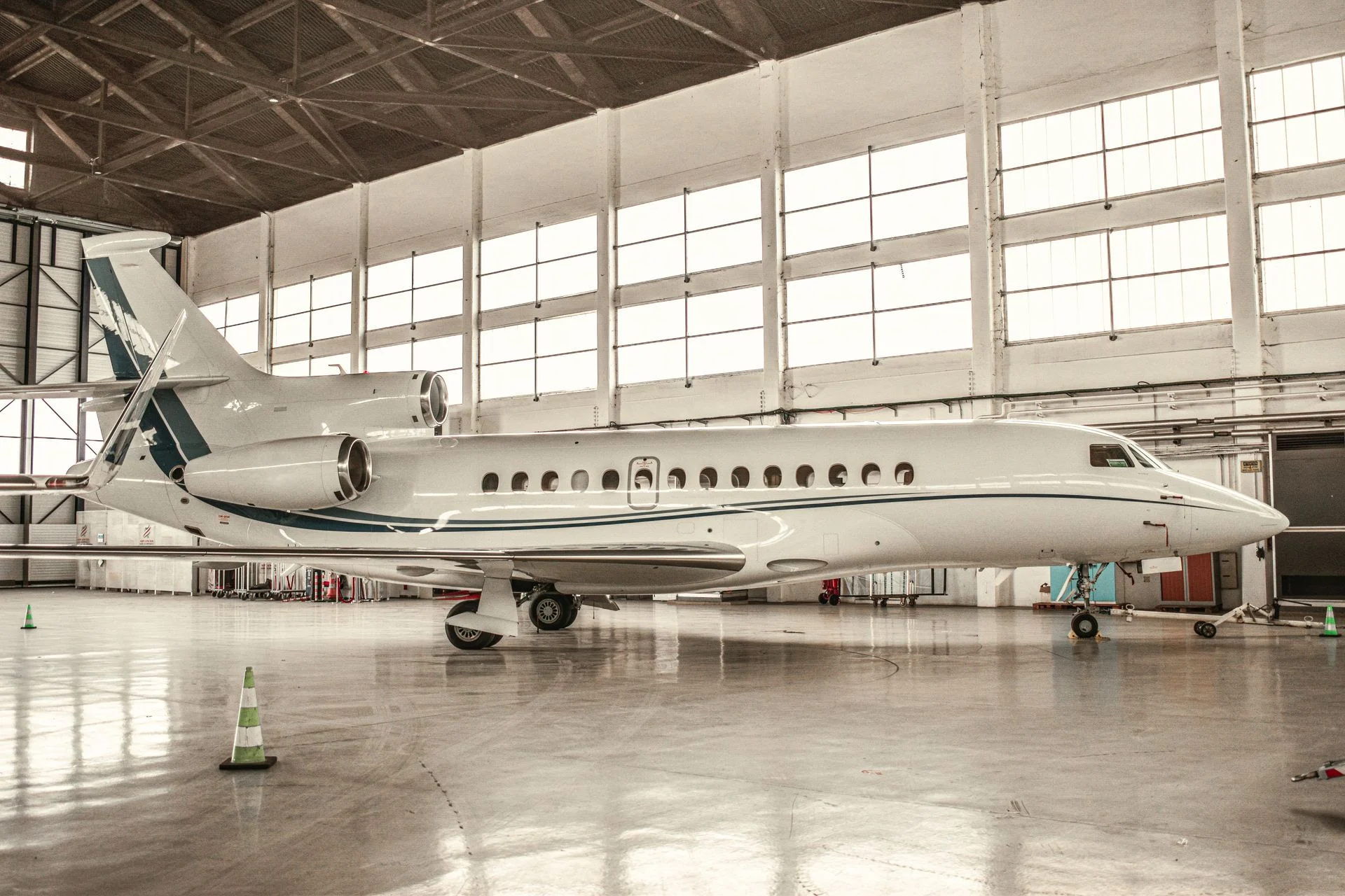 Private jet inside an aircraft hangar